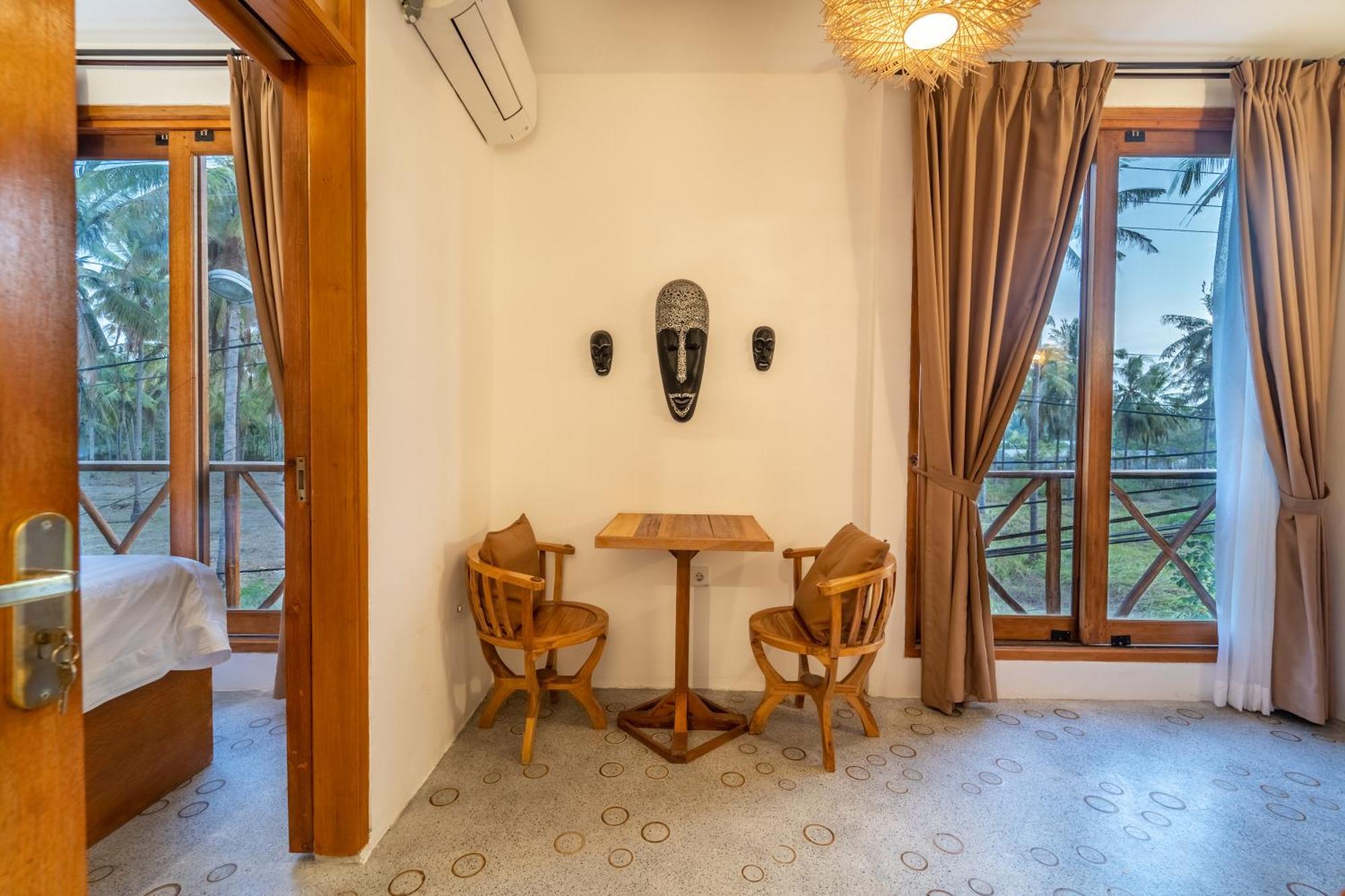 Yulaman Hotel Гілі-Траванган Номер фото