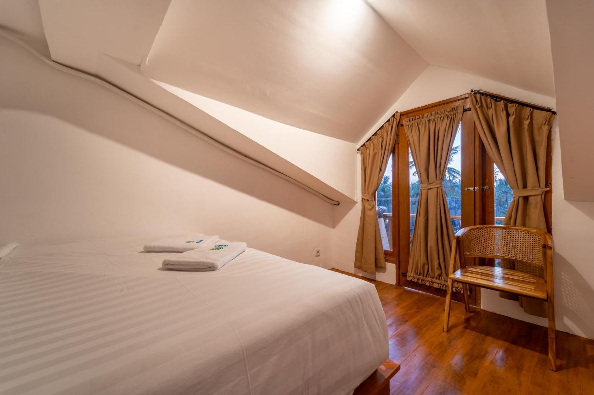 Yulaman Hotel Гілі-Траванган Номер фото