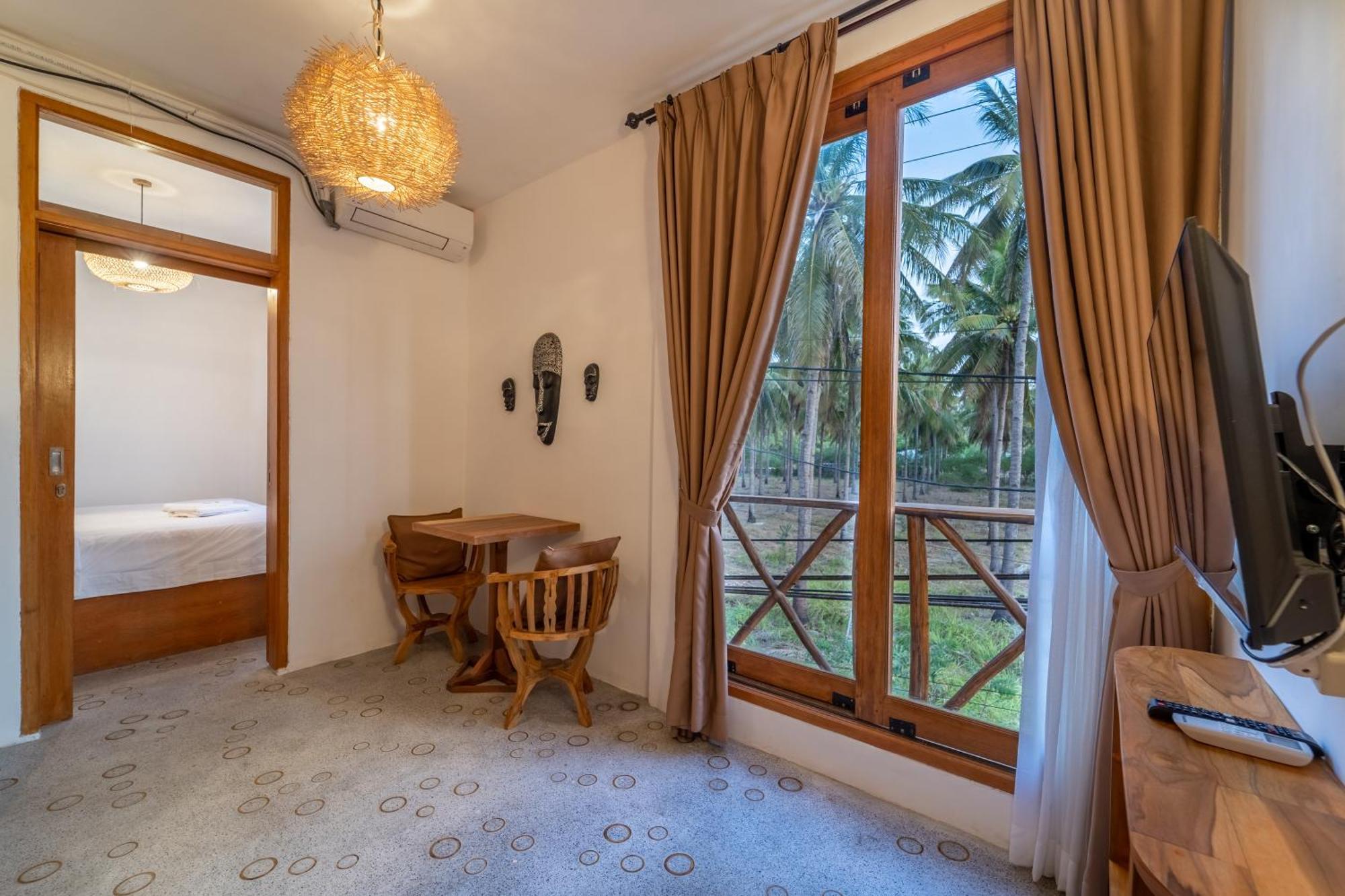 Yulaman Hotel Гілі-Траванган Номер фото
